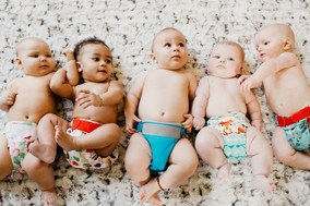 babies lying in a row